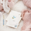 Photographie d'une carte de bienvenue pour une naissance d'un bébé par emma lidbury